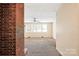 Living room with hardwood floors and a brick fireplace at 1435 W Ridge Rd, Salisbury, NC 28147