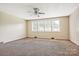 Bright living room with natural lighting and carpeted floors at 1435 W Ridge Rd, Salisbury, NC 28147
