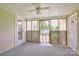 Enclosed porch with screen door access and a ceiling fan for comfort at 1435 W Ridge Rd, Salisbury, NC 28147