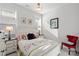 Cozy bedroom with floral bedding, natural light, and a comfortable atmosphere at 14531 Crosswater Ln, Charlotte, NC 28278