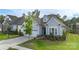 Beautiful exterior view of a well-maintained single-Gathering home with lush green lawn at 14531 Crosswater Ln, Charlotte, NC 28278