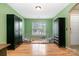 Spacious room features built-in storage and natural light, ideal for various activities at 1533 Moss Creek Dr, Harrisburg, NC 28075