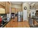 Well-equipped kitchen featuring stainless steel appliances and beautiful wooden cabinetry at 15929 Northstone Dr, Huntersville, NC 28078