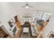 Bright living room featuring hardwood floors, a fireplace, and a view to the kitchen and breakfast nook at 15929 Northstone Dr, Huntersville, NC 28078