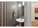 Powder room with blue and white wallpaper at 15929 Northstone Dr, Huntersville, NC 28078