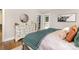 Bright bedroom with a large dresser and views of the backyard at 1621 Brookdale Ave, Charlotte, NC 28210