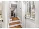 Hallway with hardwood stairs leading to other rooms in the house at 1621 Brookdale Ave, Charlotte, NC 28210