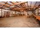 Inside of large outbuilding, featuring a brick wall with a wood stove hookup at 169 Wilcox Karriker Ln, Statesville, NC 28625