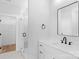 Modern bathroom features a glass enclosed shower, vanity with a large mirror, and hardwood floors at 2104 County Line Rd, Kings Mountain, NC 28086