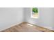 A bedroom with hardwood floors and a large window at 2104 County Line Rd, Kings Mountain, NC 28086