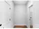Hallway leading to two rooms with hardwood floors at 2104 County Line Rd, Kings Mountain, NC 28086