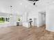 Spacious open-concept kitchen and living room area with vaulted ceilings and natural light at 2104 County Line Rd, Kings Mountain, NC 28086