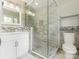 Bathroom featuring a glass shower and marble countertop at 2240 Lawton Bluff Rd, Charlotte, NC 28226