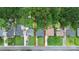 Aerial view showcasing property lines of homes, emphasizing location within a leafy neighborhood at 2421 Shamrock Dr, Charlotte, NC 28205