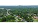 Beautiful aerial view of the property, surrounded by lush greenery and near the city at 2421 Shamrock Dr, Charlotte, NC 28205