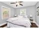 Inviting bedroom with soft, neutral tones, ample natural light, and a comfortable, cozy atmosphere at 2421 Shamrock Dr, Charlotte, NC 28205