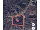 Aerial view of the property highlighted in red, showcasing its location within a wooded area at 2505 White Thorne Ln, Waxhaw, NC 28173