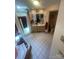 Bathroom featuring double sinks, tiled floor, walk-in shower, and a separate toilet room with decoratives at 2505 White Thorne Ln, Waxhaw, NC 28173