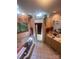 Bright bathroom with a tiled floor, jacuzzi, and shower under a large, natural light-filled skylight at 2505 White Thorne Ln, Waxhaw, NC 28173