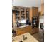 Cozy kitchen with wooden cabinets, stainless steel appliances, and a breakfast nook area at 2505 White Thorne Ln, Waxhaw, NC 28173