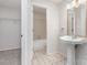Bathroom view of the vanity and showing access to tub and shower at 2512 Cranbrook Ln # 9, Charlotte, NC 28207