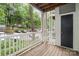 Cozy patio area with wooded view, privacy railing and exterior storage closet at 2512 Cranbrook Ln # 9, Charlotte, NC 28207