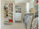 Well-organized walk-in closet with built-in storage solutions and plenty of hanging space at 2516 Selwyn Ave, Charlotte, NC 28209