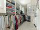 Large walk-in closet with custom shelving provides ample storage and organization at 2516 Selwyn Ave, Charlotte, NC 28209