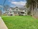 Charming two-story home with a well-manicured lawn, and landscaped garden at 2518 Pinckney Ave, Charlotte, NC 28205