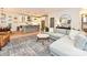 Spacious living room with hardwood floors, neutral decor, and an open layout leading to the modern kitchen at 2518 Pinckney Ave, Charlotte, NC 28205