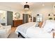 Serene main bedroom with a bed, stylish furniture, and access to an en-suite bathroom at 2518 Pinckney Ave, Charlotte, NC 28205