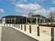 Exterior view of modern retail building with a distinctive design and inviting outdoor seating area, promoting business visibility at 2518 Pinckney Ave, Charlotte, NC 28205