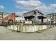 Exterior of Rhino Market & Deli with outdoor seating area, offering a welcoming and casual dining experience at 2518 Pinckney Ave, Charlotte, NC 28205