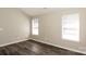 Bedroom with wood floor and multiple windows at 2599 April Showers Ln, Rock Hill, SC 29730