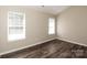 Bedroom with wood floor and multiple windows at 2599 April Showers Ln, Rock Hill, SC 29730