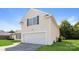 Charming home featuring a two-car garage, lawn, and neutral siding at 2599 April Showers Ln, Rock Hill, SC 29730