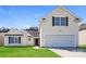 Charming home featuring a two-car garage, lawn, and neutral siding at 2599 April Showers Ln, Rock Hill, SC 29730
