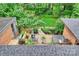 Aerial view showcasing the outdoor deck, patio, and lush landscaping at 2600 Cloister Dr, Charlotte, NC 28211