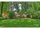 Expansive backyard with deck perfect for outdoor entertaining at 2600 Cloister Dr, Charlotte, NC 28211