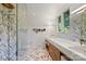 Elegant bathroom featuring marble floors, countertops, and a modern glass-enclosed shower with gold fixtures at 2600 Cloister Dr, Charlotte, NC 28211