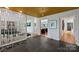 Foyer featuring slate floors, a decorative screen, and access to the living room at 2600 Cloister Dr, Charlotte, NC 28211
