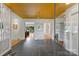 Foyer boasts slate floors, yellow ceiling, modern decor, and seamless transition to living areas at 2600 Cloister Dr, Charlotte, NC 28211
