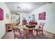 A finished basement area furnished with a chess table and seating near a staircase at 29049 Snapper Pt, Tega Cay, SC 29708