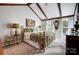 This bedroom has natural light, wooden beams, and a charming brass bed frame at 29049 Snapper Pt, Tega Cay, SC 29708