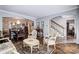 A spacious living room with hardwood floors and dining area access at 29049 Snapper Pt, Tega Cay, SC 29708