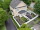 Backyard with white privacy fence, black metal roof, pergola, and lush green landscaping at 3007 Colonel Springs Way, Fort Mill, SC 29708