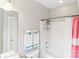 Clean bathroom with a tub, shower, and white fixtures at 3007 Colonel Springs Way, Fort Mill, SC 29708
