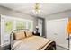 Bedroom with windows providing natural light, a ceiling fan, and closet at 3007 Colonel Springs Way, Fort Mill, SC 29708