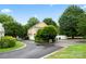 Charming two-story home with yellow siding and a well-maintained, landscaped front yard with trees at 3007 Colonel Springs Way, Fort Mill, SC 29708