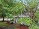 Charming two-story home with a inviting front porch and lush green landscaping at 3007 Colonel Springs Way, Fort Mill, SC 29708